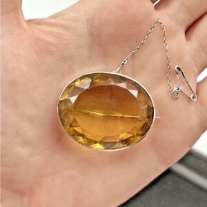 Antique Victorian citrine and silver brooch with safety chain